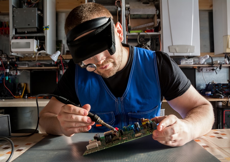 Technician performing precision repair work on a circuit board